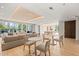 Bright living room with hardwood floors, modern furniture, and a view of the city at 214 Hunt St # 701, Durham, NC 27701