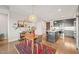 Open floor plan featuring the kitchen, dining, and living areas with natural lighting and modern finishes at 214 Hunt St # 701, Durham, NC 27701