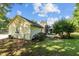 Spacious backyard featuring a well-maintained lawn, mature trees, and a fenced area at 2257 Delaney Dr, Burlington, NC 27215