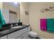 Updated bathroom with granite countertops, a stylish mirror, and modern fixtures at 2257 Delaney Dr, Burlington, NC 27215