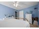 Well-lit bedroom with a brass bed frame, offering ample space and storage at 2257 Delaney Dr, Burlington, NC 27215