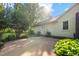 Home exterior with patio, lush landscaping, and vinyl siding at 2257 Delaney Dr, Burlington, NC 27215