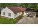 Charming ranch home with a red brick chimney, two car garage, and a beautifully landscaped front yard at 2257 Delaney Dr, Burlington, NC 27215