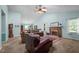 Spacious living room featuring high ceilings, a fireplace, and carpeted floors at 2257 Delaney Dr, Burlington, NC 27215