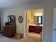 A main bedroom leads to a bathroom with double vanity and good lighting at 2257 Delaney Dr, Burlington, NC 27215