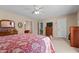Spacious main bedroom with carpet flooring, ceiling fan, and an attached bathroom at 2257 Delaney Dr, Burlington, NC 27215
