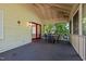 Inviting screened porch with ample seating, ideal for outdoor dining and relaxation at 2257 Delaney Dr, Burlington, NC 27215