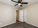 Comfortable bedroom with ceiling fan, carpet, and double door closet at 23 Joci Ct, Durham, NC 27704