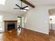 The living room boasts hardwood floors, a fireplace, access to the deck, and laundry at 23 Joci Ct, Durham, NC 27704