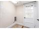 The laundry room offers a tile floor and exterior access at 232 S Marshall St, Graham, NC 27253