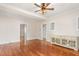 Open-concept living space with hardwood floors and doorway access to adjoining rooms at 232 S Marshall St, Graham, NC 27253
