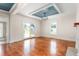 Living room with hardwood floors and a fireplace provides a cozy space to gather at 232 S Marshall St, Graham, NC 27253