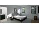 Serene bedroom featuring ample natural light, minimalist decor, and en suite bathroom access at 2344 Ballywater Lea Way, Wake Forest, NC 27587