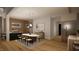 Elegant dining room with modern lighting, a sleek table, and stylish decor creating a welcoming atmosphere at 2344 Ballywater Lea Way, Wake Forest, NC 27587