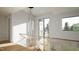 Modern hallway with sleek lighting, glass railings, and hardwood floors showcasing contemporary design elements at 2344 Ballywater Lea Way, Wake Forest, NC 27587