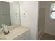 This bathroom features a large mirror, vanity, and neutral decor at 2662 Walas Ct, Creedmoor, NC 27522