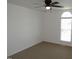 This bedroom offers a ceiling fan, ample natural light, and neutral carpeting at 2662 Walas Ct, Creedmoor, NC 27522