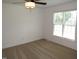 This bedroom offers a ceiling fan, ample natural light, and neutral carpeting at 2662 Walas Ct, Creedmoor, NC 27522