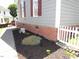 Landscaped flower bed along the side of the house at 2662 Walas Ct, Creedmoor, NC 27522