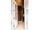 An open doorway reveals the wood-framed staircase, hinting at the home's design potential at 299 Little Lady Trail, Zebulon, NC 27597