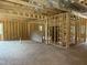 Interior framing reveals the layout of the new construction home, highlighting room structure at 299 Little Lady Trail, Zebulon, NC 27597