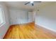 Bright bedroom with hardwood floors, a large closet, and a window offering plenty of natural light at 303 Winhaven St, Roxboro, NC 27573