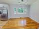 Charming dining room with modern lighting and large windows with treed outdoor views at 303 Winhaven St, Roxboro, NC 27573