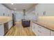 Spacious kitchen with an island, stainless steel appliances, and granite countertops at 303 Winhaven St, Roxboro, NC 27573