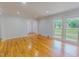 Bright living room features hardwood floors, natural light, and a neutral color palette at 303 Winhaven St, Roxboro, NC 27573