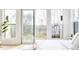 Sliding doors open from main bedroom to the balcony, offering relaxing outdoor seating with a scenic neighborhood view at 322 S Dixon Ave # R, Cary, NC 27511