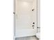 This bathroom features sleek fixtures, black hardware and a tub with unique vertically stacked subway tile at 322 S Dixon Ave # R, Cary, NC 27511