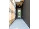 Modern home entrance with a light blue glass door and wood slat architectural detail at 322 S Dixon Ave # R, Cary, NC 27511