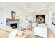 Inviting living room with modern fireplace, wood floors, and open floorplan at 322 S Dixon Ave # R, Cary, NC 27511