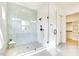 Contemporary walk-in shower with a glass door and decorative tiles offers a spa-like experience at 322 S Dixon Ave # R, Cary, NC 27511