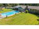A lush backyard featuring a sparkling pool and plenty of space for outdoor enjoyment at 3315 Swepsonville Saxapahaw Rd, Graham, NC 27253