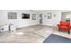 Finished basement area with comfortable seating, playful decor and plenty of natural light, perfect for Gathering enjoyment at 3315 Swepsonville Saxapahaw Rd, Graham, NC 27253
