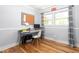 Bright bedroom with natural light, desk, bulletin board, and a cozy space for work or relaxation at 3315 Swepsonville Saxapahaw Rd, Graham, NC 27253