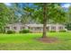 Charming single-story home with a well-maintained lawn and inviting front porch at 3315 Swepsonville Saxapahaw Rd, Graham, NC 27253