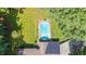 Aerial view of a blue in-ground pool with lounge chairs and bench seating at 3315 Swepsonville Saxapahaw Rd, Graham, NC 27253