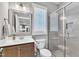 Modern bathroom with glass shower and wood vanity at 503 Bendemeer Ln, Rolesville, NC 27571