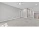 An expansive bedroom boasts plush carpeting, neutral walls, and bright, natural light at 503 Bendemeer Ln, Rolesville, NC 27571
