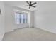 Carpeted bedroom with natural light and ceiling fan at 503 Bendemeer Ln, Rolesville, NC 27571