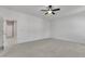 A bright, spacious bedroom featuring neutral walls, carpeted flooring and a ceiling fan at 503 Bendemeer Ln, Rolesville, NC 27571
