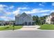 Spacious home with a two-car garage, well-maintained lawn, and attractive landscaping at 503 Bendemeer Ln, Rolesville, NC 27571