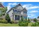 Charming home featuring stone accents, mature landscaping, and a covered front porch at 503 Bendemeer Ln, Rolesville, NC 27571