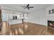 Open living room with fireplace and view of kitchen at 503 Bendemeer Ln, Rolesville, NC 27571