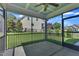 Open screened-in porch with ceiling fan, perfect for enjoying the outdoors at 503 Bendemeer Ln, Rolesville, NC 27571