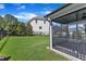 Serene screened porch with a backyard view and lush greenery at 503 Bendemeer Ln, Rolesville, NC 27571