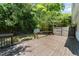 Private backyard retreat featuring a wooden deck and lush greenery at 505 Drolmond Dr, Raleigh, NC 27615