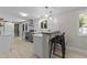 Updated kitchen featuring stainless steel appliances, white cabinets, and modern finishes at 505 Drolmond Dr, Raleigh, NC 27615
